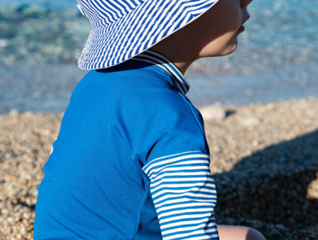 L'importance des vêtements anti-uv pour bébé